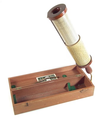 Lot 108 - Fuller's spiral slide rule calculator by W.F. Stanley in original mahogany box with paper label