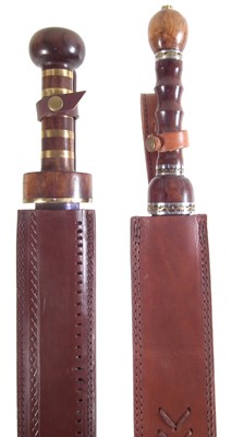 Lot 357 - Two modern replicas of a Roman Sparta cavalry sword and scabbard