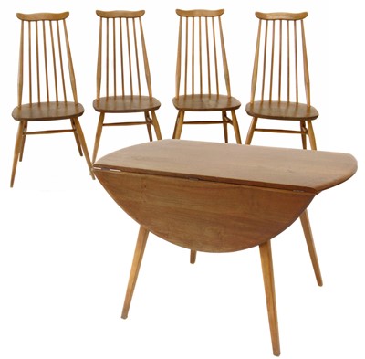 Lot 210 - Four ash and elm Ercol table and dining chairs