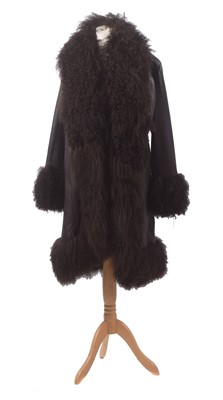 Lot 138 - A leather and wool coat by Harrods of Knightsbridge