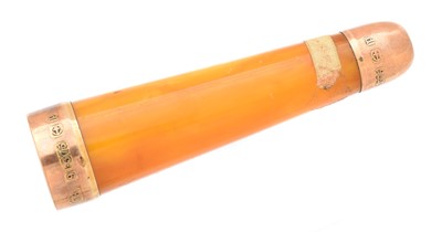 Lot 51 - A 9ct gold amber cigarette holder