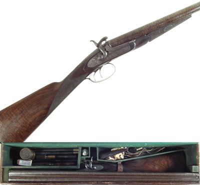 Lot 95 - Thompson of Hexham 12 bore pinfire double barrel shotgun with a period case.