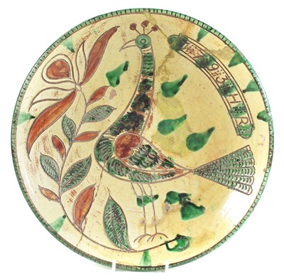 Lot 241 - Continental pottery charger dated 1793