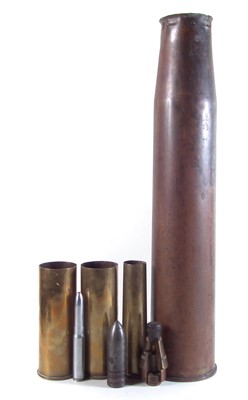 Lot 314 - Four shell cases, section mortar fuse, drill round and one other bullet head