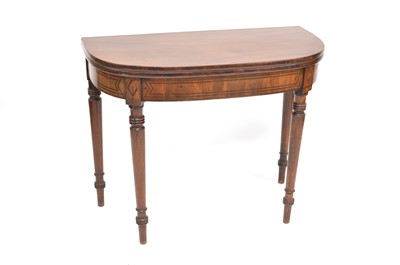 Lot 420 - Early 19th-century mahogany fold-over tea table