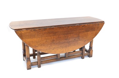Lot 250 - 20th-century oak drop-leaf dining table of 17th-century design