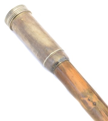 Lot 128 - A George V silver topped walking cane