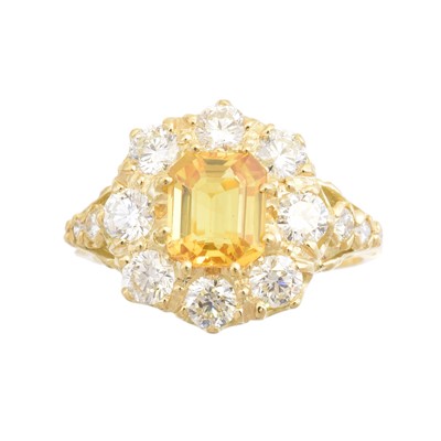 Lot 168 - A sapphire and diamond cluster ring