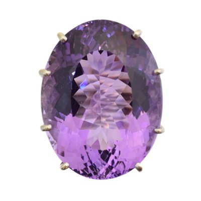Lot 235 - A 9ct gold amethyst and diamond dress ring