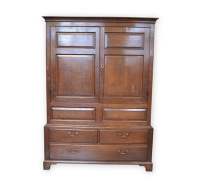 Lot 441 - 18th-century oak livery cupboard