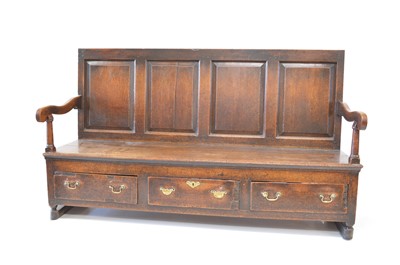 Lot 393 - George III oak box settle