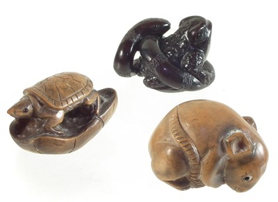Lot 308 - Three Japanese carved wood Netsukes