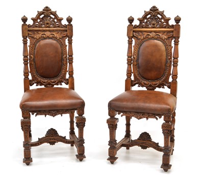 Lot 313 - A set of eight mid-19th-century continental carved oak single dining chairs