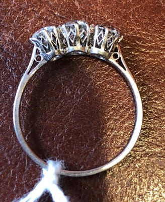 Lot 111 - A diamond three stone ring
