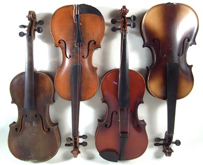Lot 20 - Four violins in cases