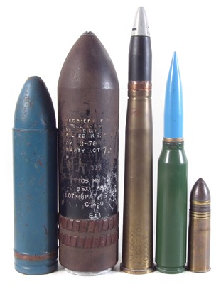 Lot 389 - Two inert shell heads and three artillery shells