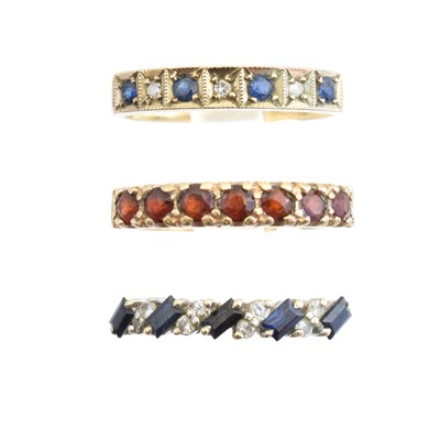 Lot 48 - Three 9ct gold gem-set band rings