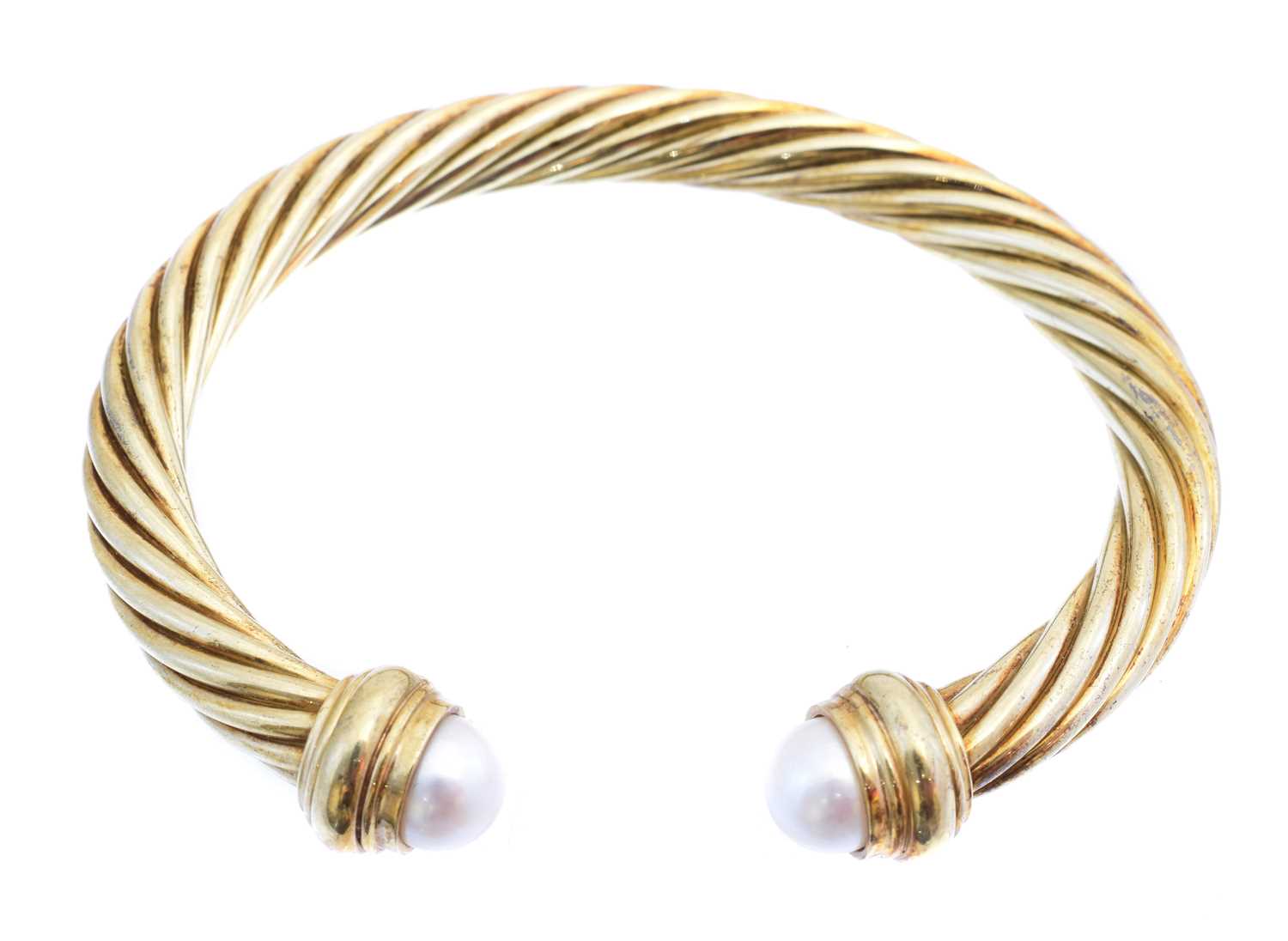 Lot 27 - A cultured pearl torque bangle by David Yurman