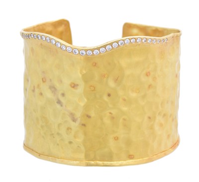 Lot 25 - A diamond cuff bangle