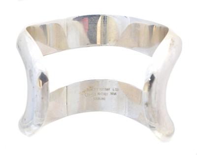 Lot 23 - A silver cuff bangle by Elsa Peretti for Tiffany & Co.