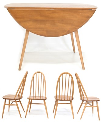 Lot 241 - Ercol Dining table and Chairs