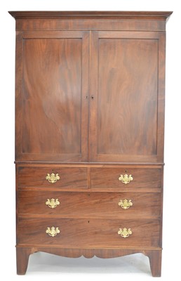 Lot 304 - George III mahogany linen press