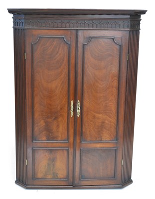 Lot 427 - George III mahogany wall hanging corner cupboard