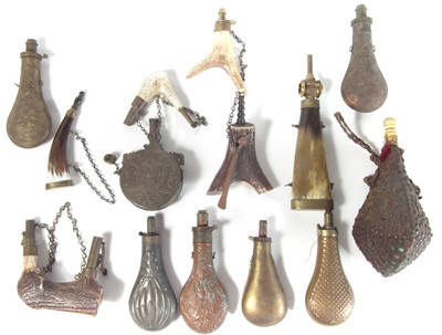 Lot 323 - Collection of fourteen powder flasks.