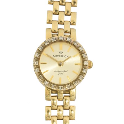 Lot 149 - A 9ct gold diamond Sovereign quartz watch