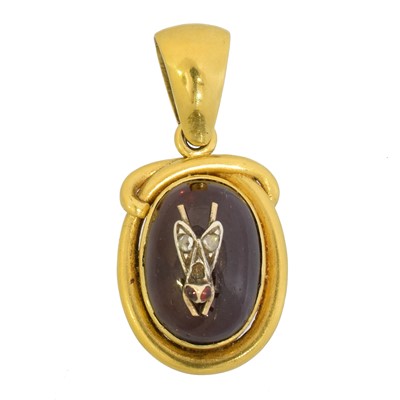 Lot 52 - A Victorian foil back garnet and diamond bug pendant