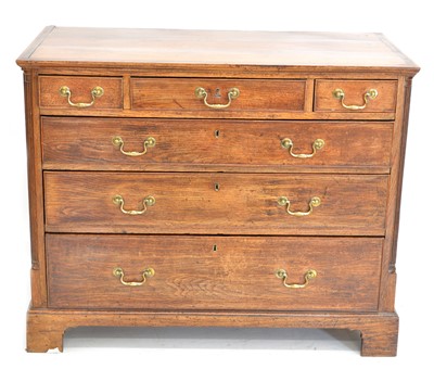 Lot 287 - George III oak mahogany crossbanded chest of drawers