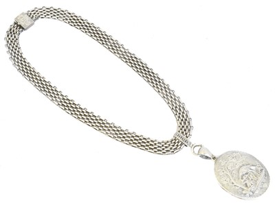 Lot 51 - A late Victorian Aesthetic white metal hinged locket