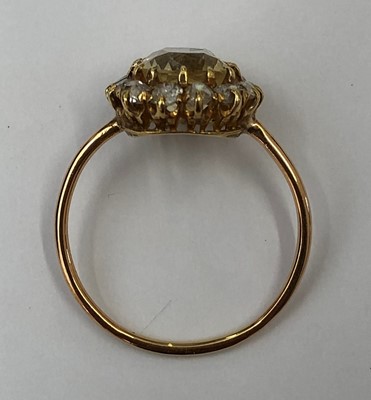 Lot 86 - A sapphire and diamond cluster ring