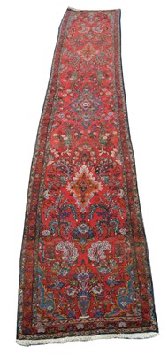 Lot 311 - Early 20th-century Sarouk carpet runner