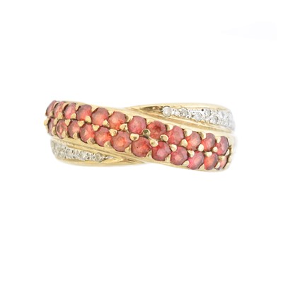 Lot 81 - A sapphire and diamond band ring