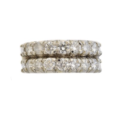 Lot 74 - A diamond band ring