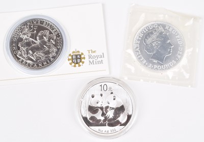Lot 69 - Three one ounce silver coins (3).