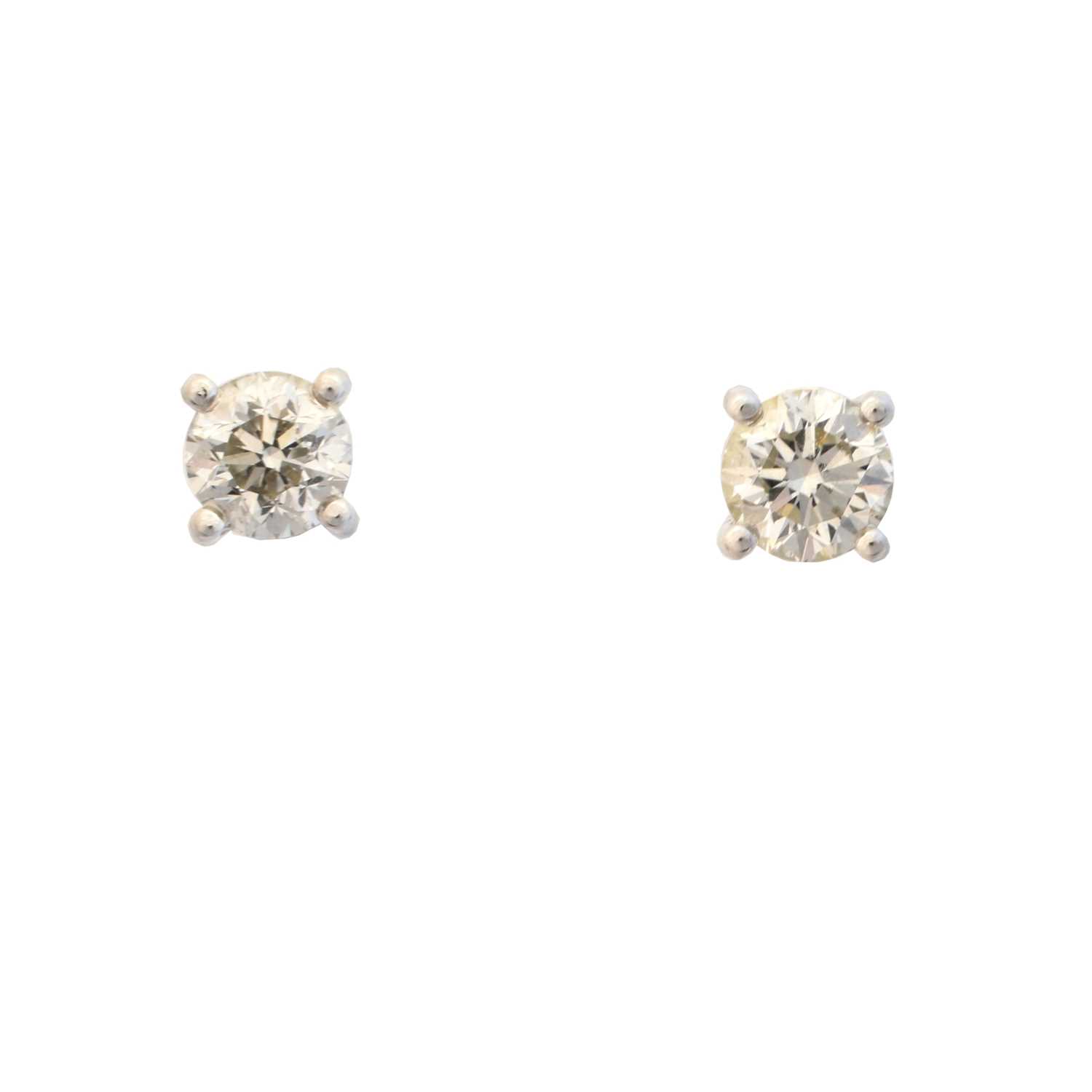 Lot 40 - A pair of 18ct gold diamond stud earrings