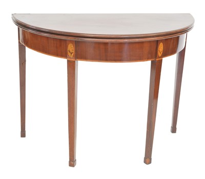 Lot 261 - George III mahogany fold-over tea table