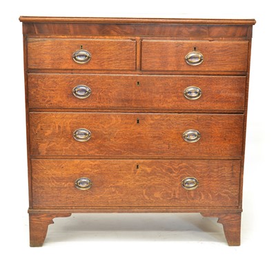 Lot 429 - George III oak chest of drawers