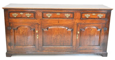Lot 438 - 18th-century fruitwood oak and elm dresser base
