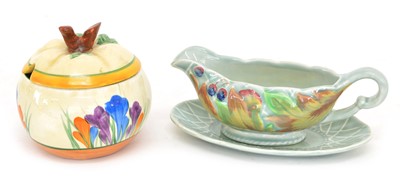 Lot 122 - Clarice Cliff Crocus preserve pot and a sauceboat