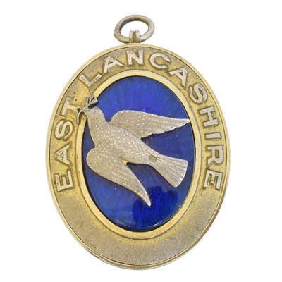Lot 18 - A silver gilt and enamel masonic locket