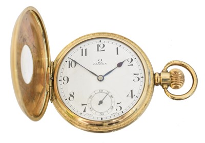 Lot 203 - A gold plated Omega half hunter pocket watch