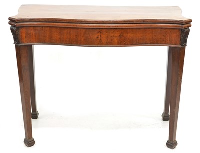 Lot 405 - Early 19th-century mahogany serpentine front fold-over card table