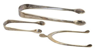 Lot 150 - Three George III and later silver sugar nips