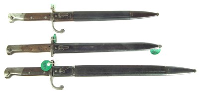 Lot 81 - Three bayonets and scabbards