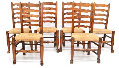 Lot 373 - A set of six Lancashire wavy ladder-back ash and elm single dining chairs