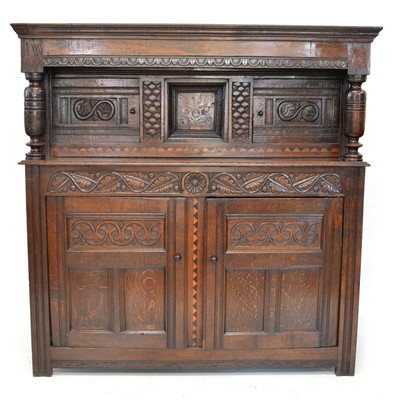 Lot 322 - 17th-century oak court cupboard