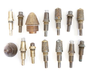 Lot 131 - Twelve WWI French artillery shell fuses and two British examples.